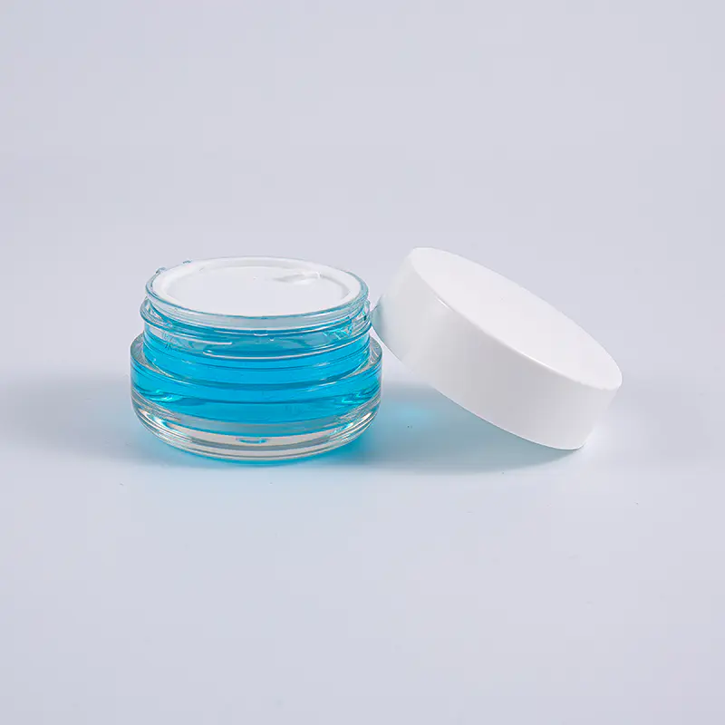 شیشه کرم دیواری 50 گرمی دایره شکل شفاف PETG با درپوش پیچی سفید شیشه کرم دیواری 50 گرمی دایره شکل شفاف PETG با درپوش پیچی سفید